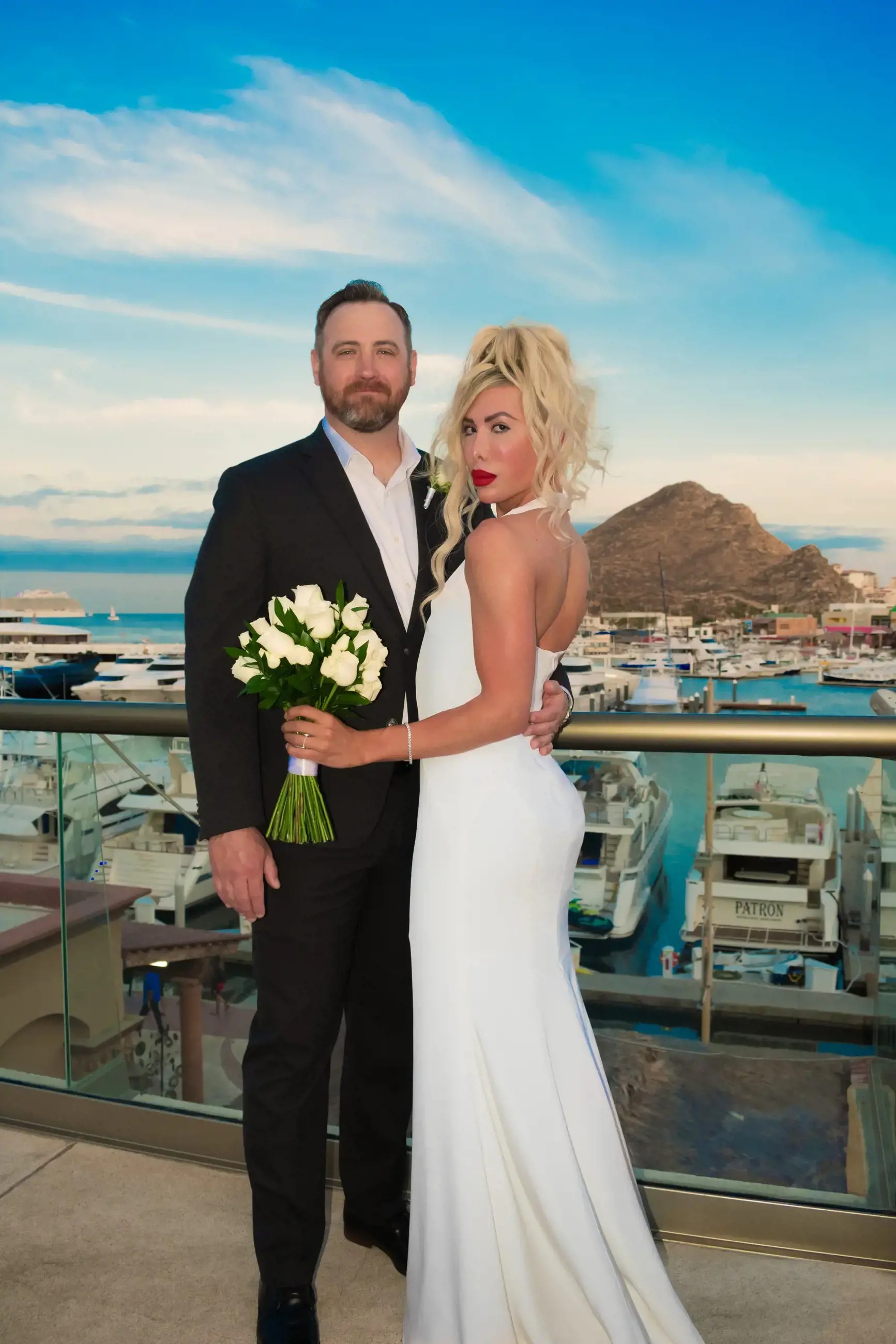 Bride and groom posing for wedding photo
